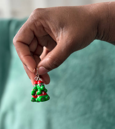 Handmade green gummy bear earrings inspired by the Phillie Phanatic, lightweight and playful Philly-themed jewelry from Pretty Weird.