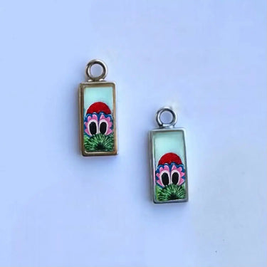 Powder blue peeking Phanatic pendant on gold and silver comparison