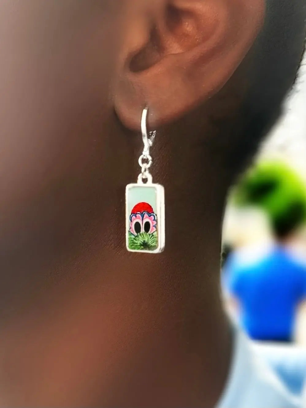 Hand painted Powder blue peeking Phanatic earring