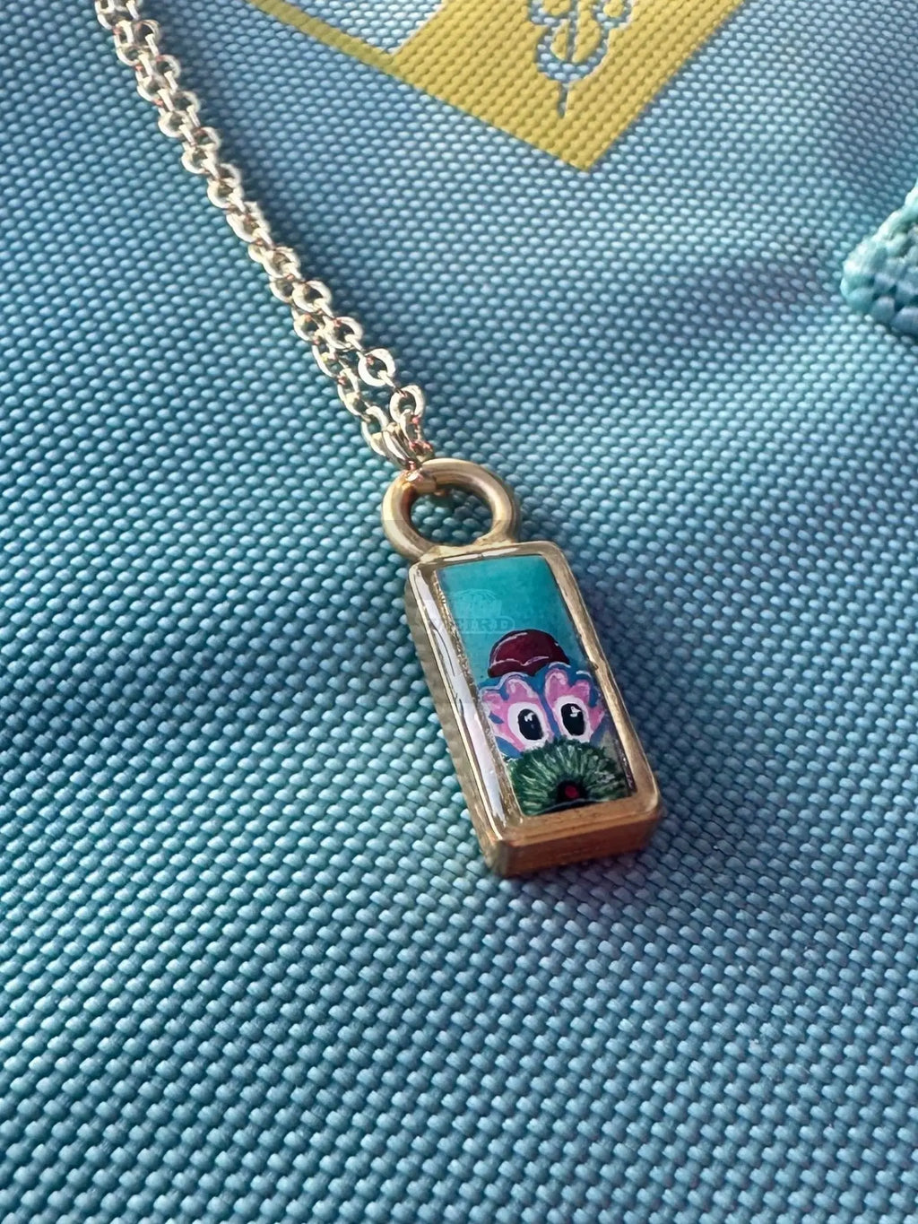 Baby Peeking Phanatic | Hand-Painted Pendant Necklace Pretty Weird
